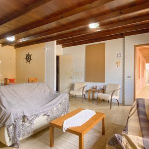 Casa com 152m², 3 dormitórios, 1 suíte, 4 vagas no bairro Praia da Cal em Torres para Comprar