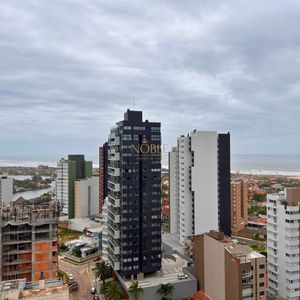 Apartamento com 91m², 2 dormitórios, 2 suítes, 2 vagas no Toronto em Torres para Comprar