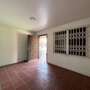 Casa com 100m², 2 dormitórios, 3 vagas no bairro Praia da Cal em Torres para Comprar