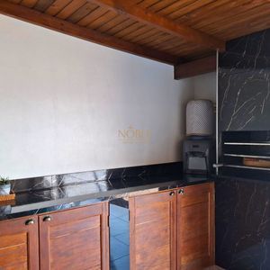 Casa com 102m², 2 dormitórios, 1 suíte, 2 vagas no bairro Igra Sul em Torres para Comprar