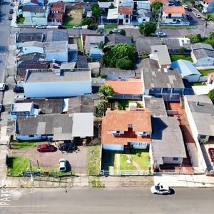 Casa com 209m², 3 dormitórios, 1 suíte, 2 vagas no bairro Igra em Torres para Comprar