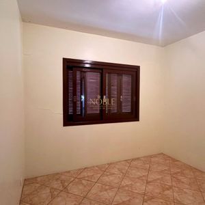 Casa com 420m², 5 dormitórios, 3 suítes, 1 vaga no bairro Centro em Torres para Comprar