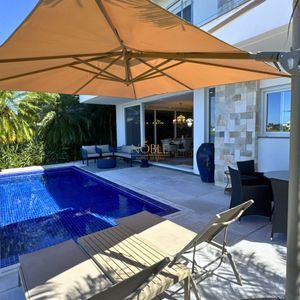 Casa de Condomínio com 444m², 4 dormitórios, 4 suítes, 4 vagas no Reserva das Águas em Torres para Comprar