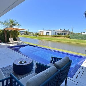 Casa de Condomínio com 444m², 4 dormitórios, 4 suítes, 4 vagas no Reserva das Águas em Torres para Comprar