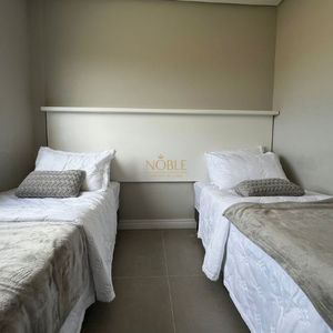 Apartamento com 74m², 2 dormitórios, 1 suíte, 1 vaga no Essenza em Torres para Comprar