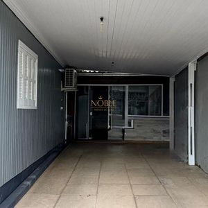 Casa com 130m², 2 dormitórios, 2 vagas no bairro Praia da Cal em Torres para Comprar