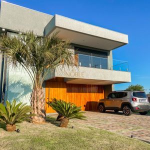 Casa de Condomínio com 375m², 4 dormitórios, 4 suítes, 2 vagas no Condomínio Ilhas Park em Torres para Comprar