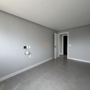 Apartamento com 108m², 3 dormitórios, 1 suíte, 2 vagas no Maui Residencial em Torres para Comprar