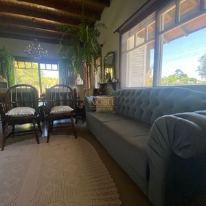 Casa com 135m², 3 dormitórios, 1 suíte, 1 vaga no bairro Bela Vista em Passo de Torres para Comprar