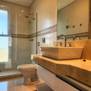 Casa de Condomínio com 440m², 5 dormitórios, 5 suítes, 2 vagas no Ocean Side em Torres para Comprar