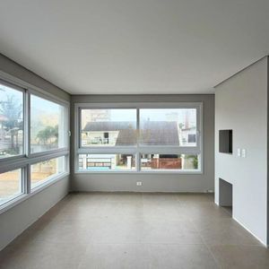 Apartamento com 70m², 2 dormitórios, 1 suíte, 1 vaga no Topazio em Torres para Comprar