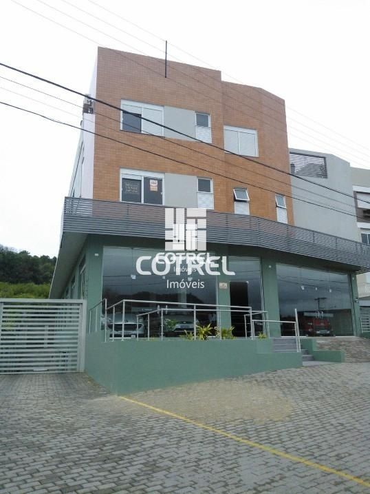 Apartamento 3 dormitórios sendo 1 suíte e 2 vagas de garagem no Bairro Km3 local
