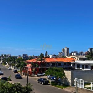 Apartamento com 60m², 2 dormitórios, 1 suíte, 1 vaga no Residencial Morada do Sol em Torres para Comprar