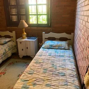 Casa com 247m², 5 dormitórios, 3 suítes, 3 vagas no bairro Praia Grande em Torres para Comprar