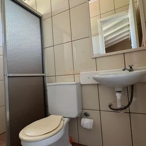 Sobrado com 290m², 4 dormitórios, 1 suíte, 2 vagas no bairro Igra Norte em Torres para Comprar
