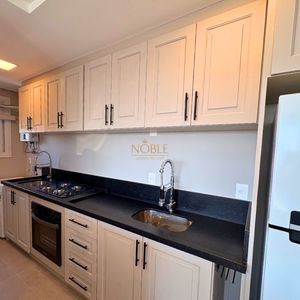 Apartamento com 72m², 2 dormitórios, 1 suíte, 1 vaga no Topazio em Torres para Comprar