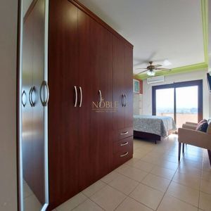 Apartamento com 131m², 3 dormitórios, 1 suíte, 2 vagas no Torre do Sol em Torres para Comprar