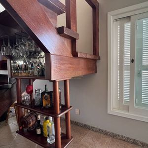 Sobrado com 290m², 4 dormitórios, 1 suíte, 2 vagas no bairro Igra Norte em Torres para Comprar