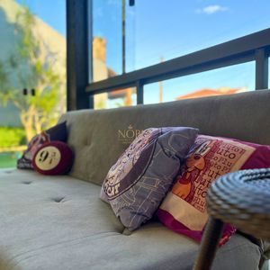 Casa com 184m², 3 dormitórios, 1 suíte, 2 vagas no bairro Igra Norte em Torres para Comprar