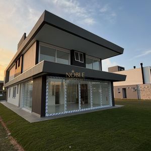 Casa com 474m², 4 dormitórios, 4 suítes, 2 vagas no Condomínio Ilhas Park em Torres para Comprar