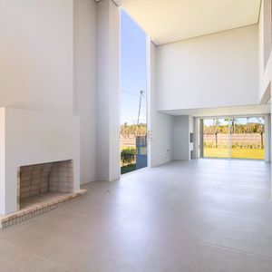 Casa de Condomínio com 260m², 4 dormitórios, 4 suítes, 2 vagas no Reserva das Águas em Torres para Comprar
