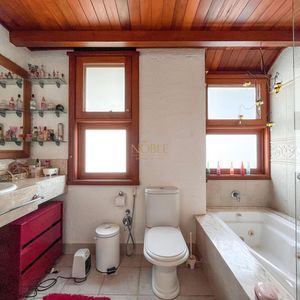 Casa, 4 dormitórios, 2 suítes, 3 vagas no bairro Praia Grande em Torres para Comprar