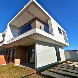 Geminado com 120m², 3 dormitórios, 1 suíte no bairro Morada das Palmeiras em Torres para Comprar