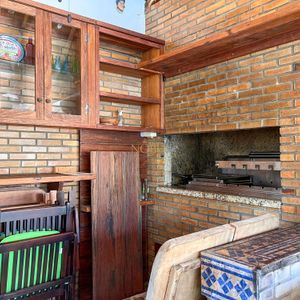 Casa, 4 dormitórios, 2 suítes, 3 vagas no bairro Praia Grande em Torres para Comprar