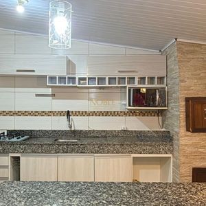 Casa com 130m², 2 dormitórios, 2 vagas no bairro Praia da Cal em Torres para Comprar