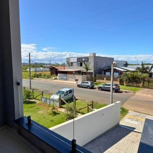 Geminado com 110m², 3 dormitórios, 1 suíte, 1 vaga no bairro Morada das Palmeiras em Torres para Comprar