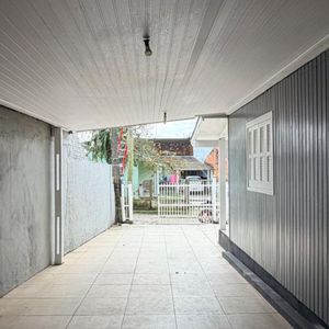 Casa com 130m², 2 dormitórios, 2 vagas no bairro Praia da Cal em Torres para Comprar