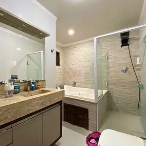 Casa com 148m², 3 dormitórios, 1 suíte, 2 vagas no bairro Morada das Palmeiras em Torres para Comprar