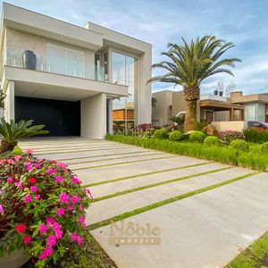 Casa de Condomínio com 432m², 4 dormitórios, 3 suítes, 2 vagas no Reserva das Águas em Torres para Comprar