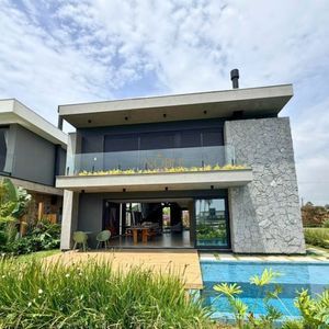 Casa de Condomínio com 390m², 5 dormitórios, 5 suítes, 3 vagas no Condomínio Ilhas Park em Torres para Comprar