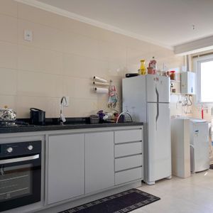 Apartamento, 2 dormitórios, 1 suíte, 1 vaga no Edifício Moma em Torres para Comprar
