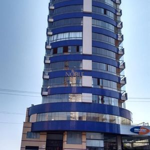 Apartamento com 124m², 3 dormitórios, 1 suíte, 2 vagas no Torre do Sol em Torres para Comprar