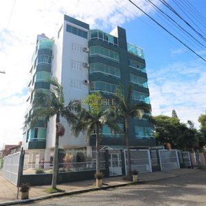 Apartamento com 95m², 3 dormitórios, 1 suíte, 1 vaga no Residencial das Palmeiras em Torres para Comprar