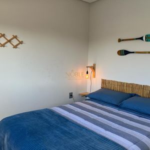 Apartamento com 74m², 2 dormitórios, 1 suíte, 2 vagas no Essenza em Torres para Comprar