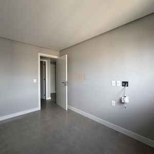 Apartamento com 77m², 2 dormitórios, 1 suíte, 2 vagas no Maui Residencial em Torres para Comprar