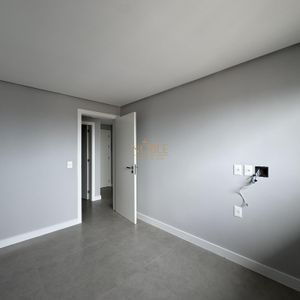 Apartamento com 77m², 2 dormitórios, 1 suíte, 2 vagas no Maui Residencial em Torres para Comprar