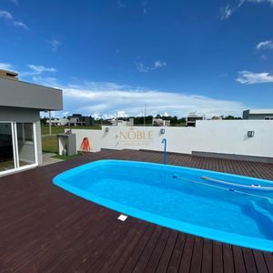 Casa de Condomínio com 151m², 3 dormitórios, 2 suítes, 2 vagas no Reserva das Águas em Torres para Comprar