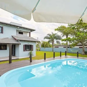 Casa, 4 dormitórios, 1 suíte, 2 vagas no bairro Itapeva Norte em Torres para Comprar