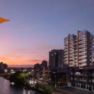 Apartamento com 102m², 3 dormitórios, 1 suíte, 2 vagas no Santo Carlo em Torres para Comprar