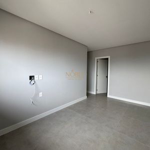 Apartamento com 102m², 3 dormitórios, 1 suíte, 2 vagas no Maui Residencial em Torres para Comprar