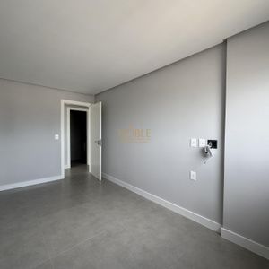Apartamento com 102m², 3 dormitórios, 1 suíte, 2 vagas no Maui Residencial em Torres para Comprar