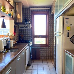 Apartamento com 102m², 2 dormitórios, 1 suíte, 1 vaga no La Tour em Torres para Comprar