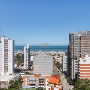 Apartamento com 100m², 3 dormitórios, 1 suíte, 2 vagas no Ibiza em Torres para Comprar