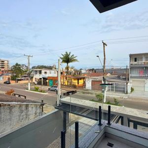 Geminado com 106m², 3 dormitórios, 1 suíte, 1 vaga no bairro Praia da Cal em Torres para Comprar