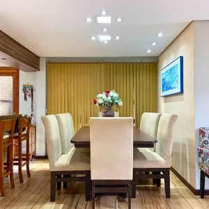 Casa com 272m², 4 dormitórios, 1 suíte, 3 vagas no bairro Igra Norte em Torres para Comprar
