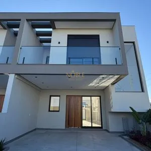 Geminado com 141m², 3 dormitórios, 1 suíte, 2 vagas no bairro Morada das Palmeiras em Torres para Comprar